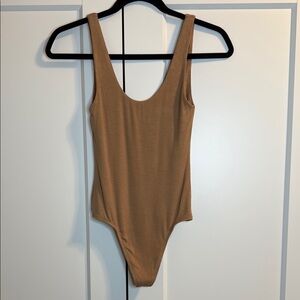 Babaton Tan Bodysuit with High-Cut Leg and Scoop Neckline